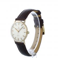 Gents Omega Geneve  18 CT case with Silver dial