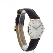 Gents Omega Geneve  18 CT case with Silver dial