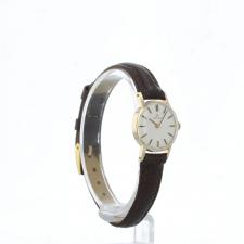 Ladies Omega     9 CT case with Silver dial