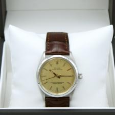Gents Rolex Oyster Perpetual 1002 Steel case with Champagne dial