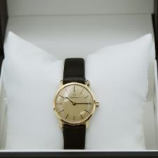Ladies Omega Dress 9 CT case with Gilt dial