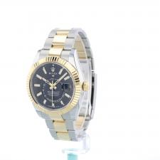 Gents Rolex Sky Dweller 336933 18ct Yellow Gold Stainless Steel case with Black dial