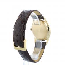Gents Omega Dress 9 CT case with Silver dial