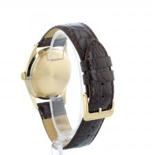 Gents Omega Dress 9 CT case with Silver dial