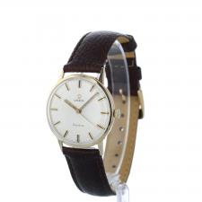 Gents Omega Geneve  18 CT case with Silver dial