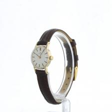 Ladies Omega     9 CT case with Silver dial