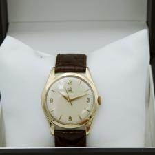 Gents Omega Dress 9 CT case with Silver dial