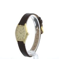 Ladies Omega DeVille 18 CT case with Champagne dial